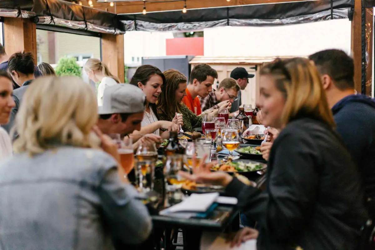 Big Group Sitting Together Enjoying Weekend Specials