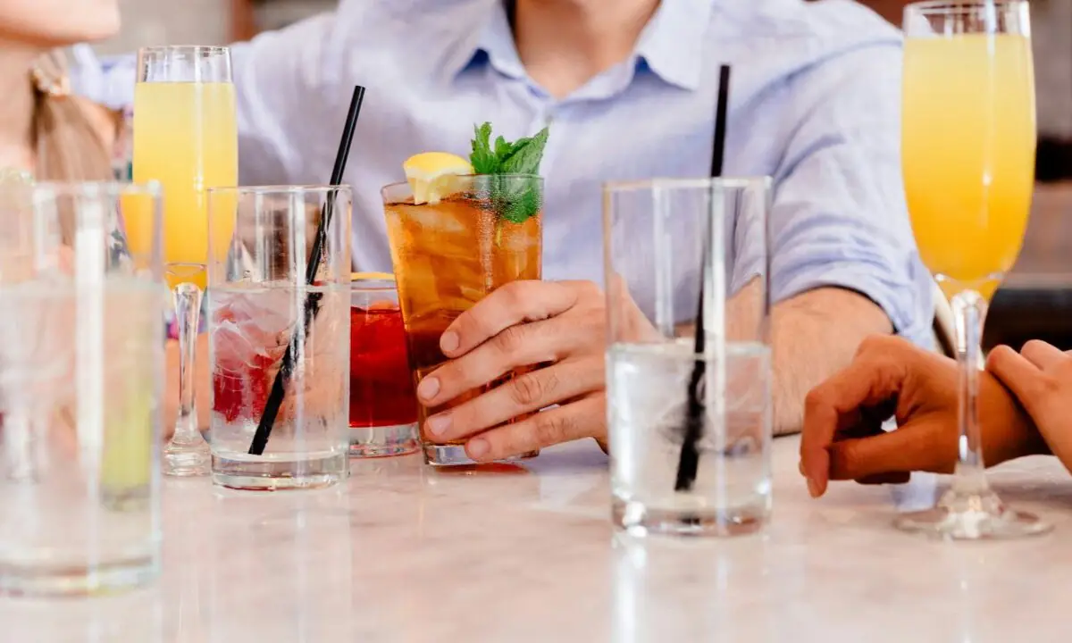 Friends enjoying cocktails and mimosas at a Cape Town restaurant